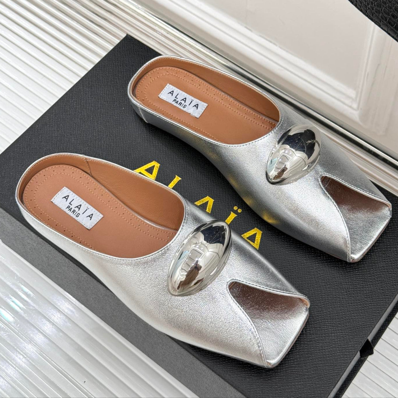 ALAIA FLAT MULE IN SILVER LAMBSKIN WITH SILVER HARDWARE - 35