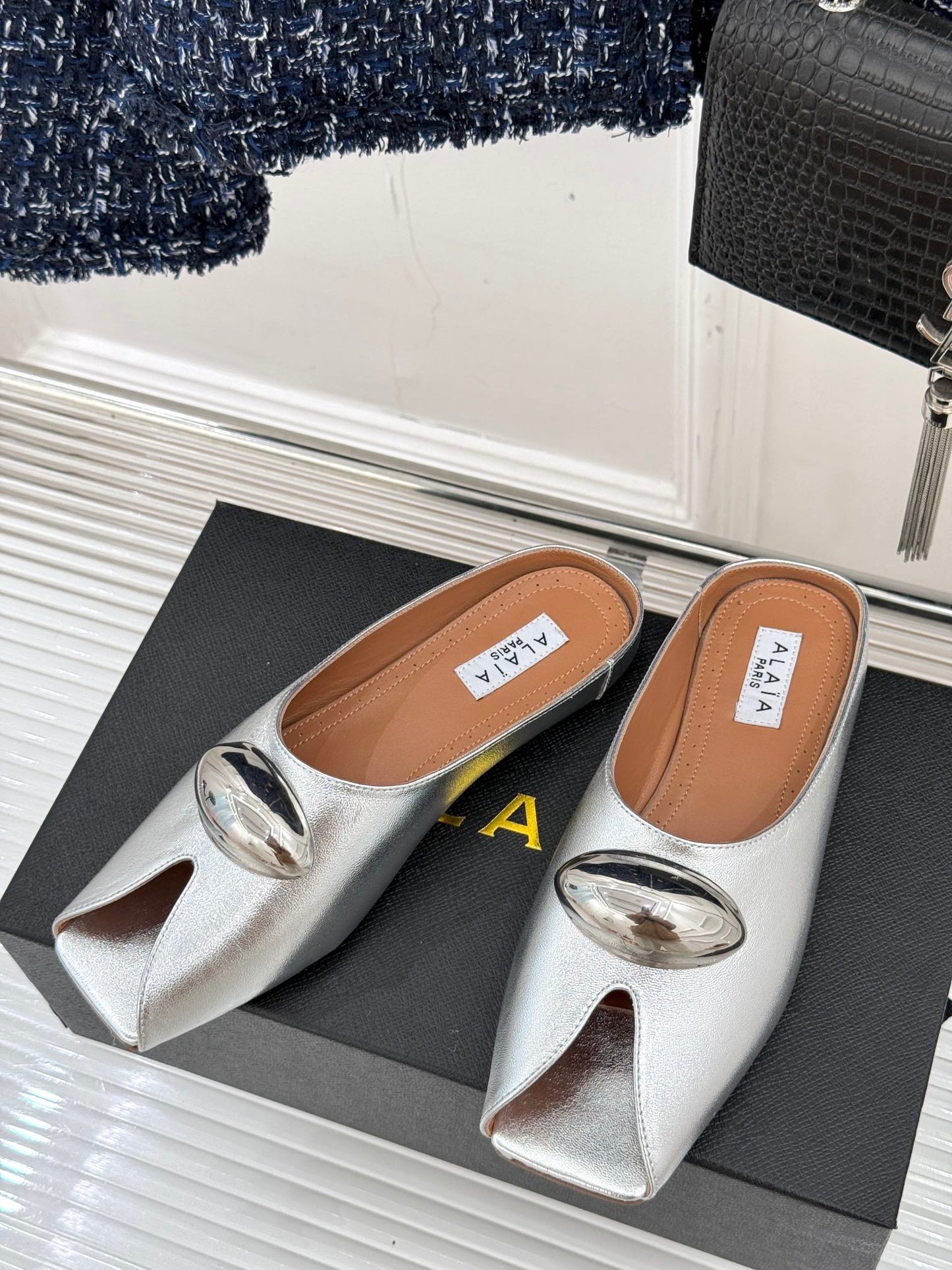 ALAIA FLAT MULE IN SILVER LAMBSKIN WITH SILVER HARDWARE - 35