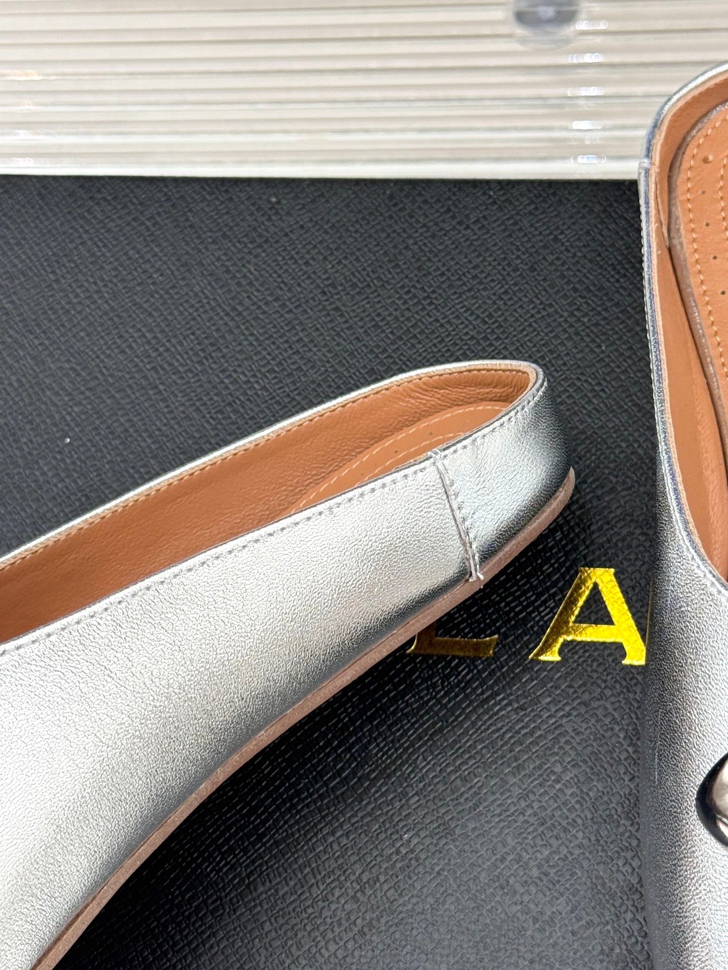 ALAIA FLAT MULE IN SILVER LAMBSKIN WITH SILVER HARDWARE - 35
