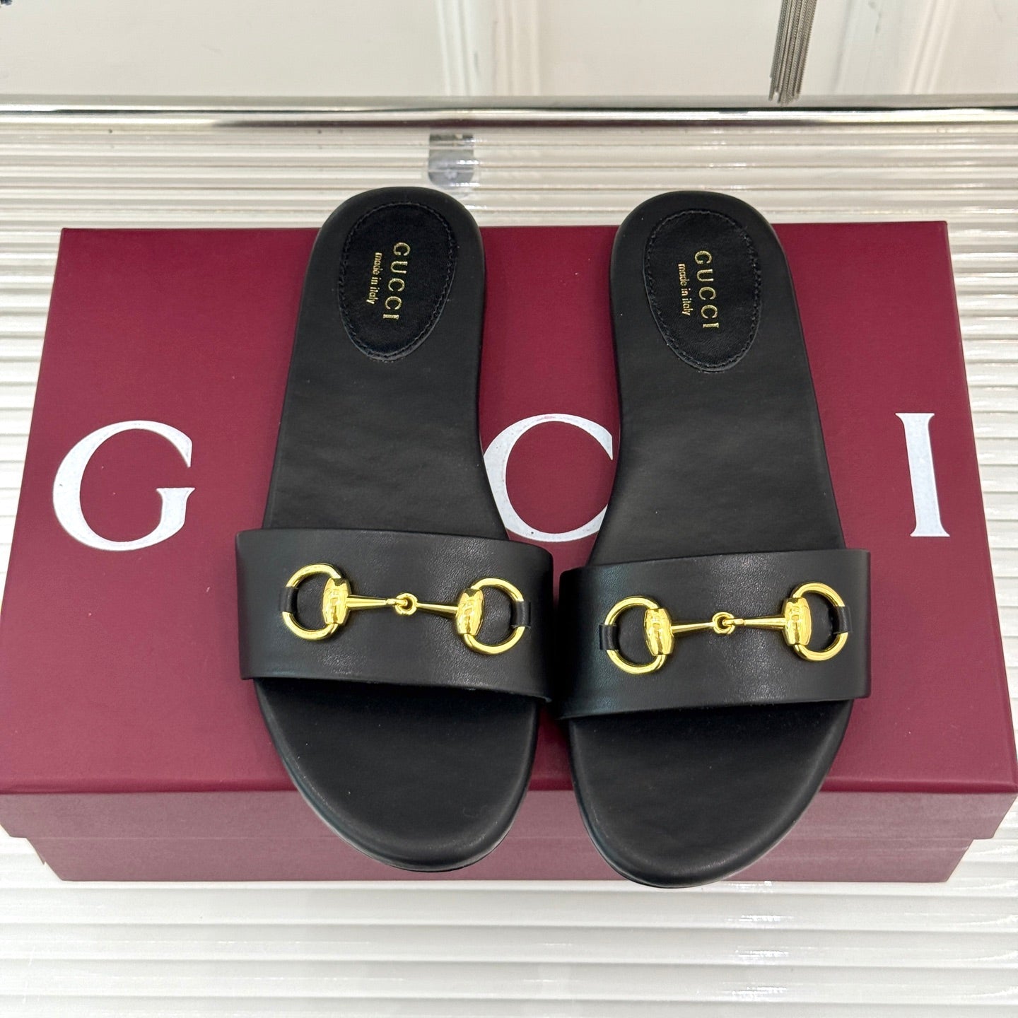 SLIDE SANDALS IN BLACK CALFSKIN WITH GOLD HARDWARE - 35