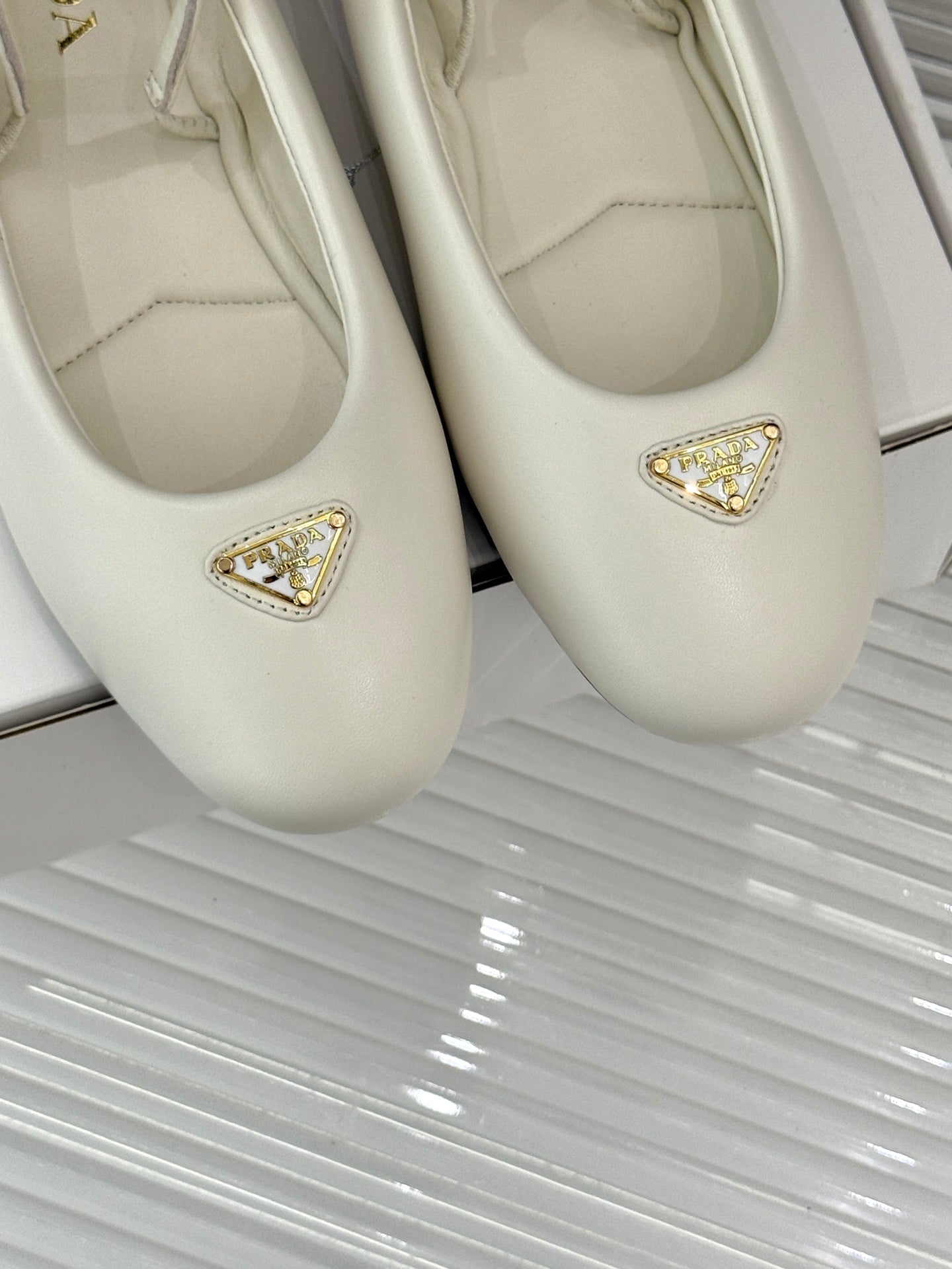 PRADA 25S SOFT PADDED BALLERINAS IN IVORY NAPPA LEATHER - 35