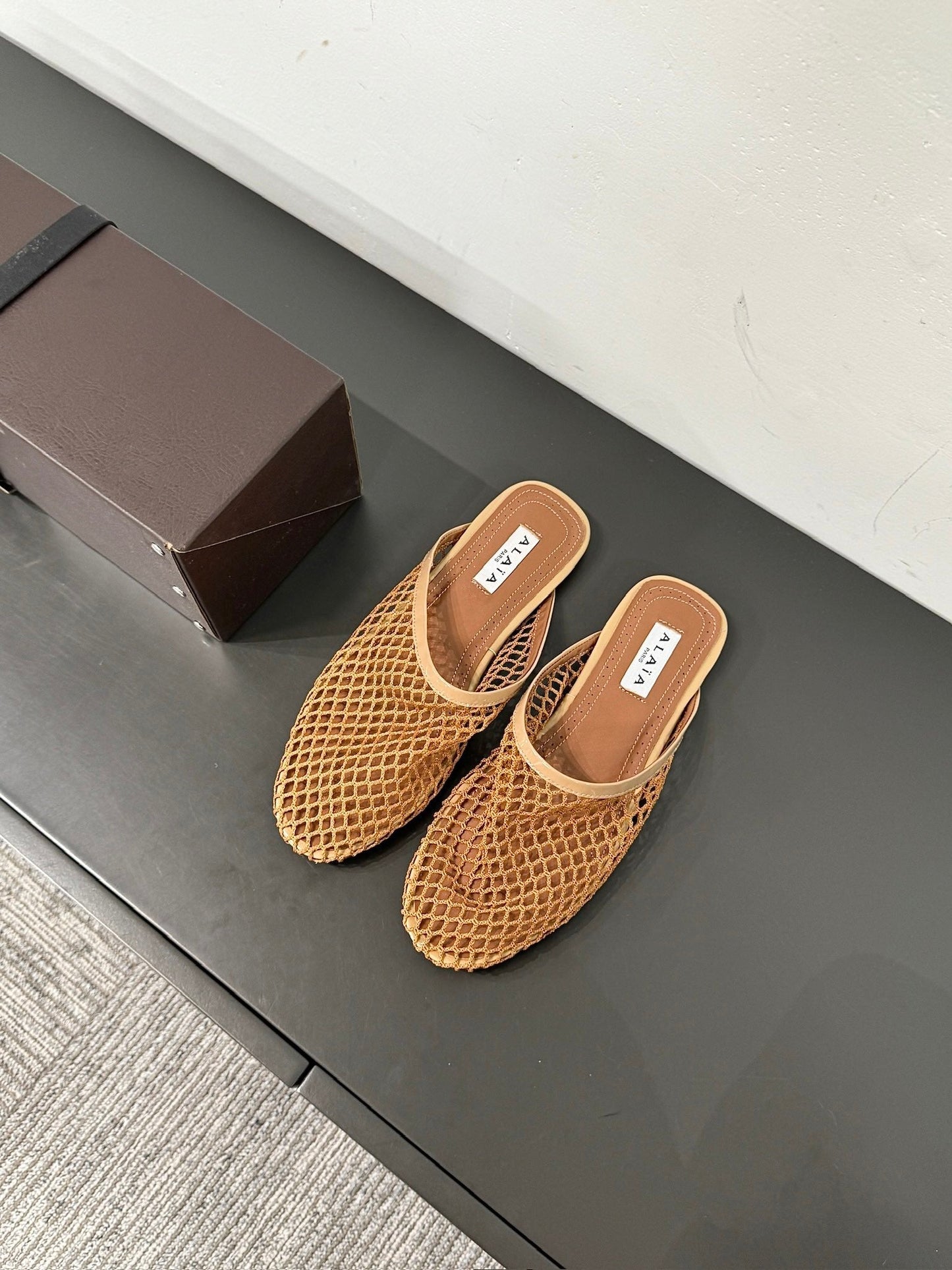 ALAIA FLAT MULES IN COPPER BROWN MESH FISHNET - 34