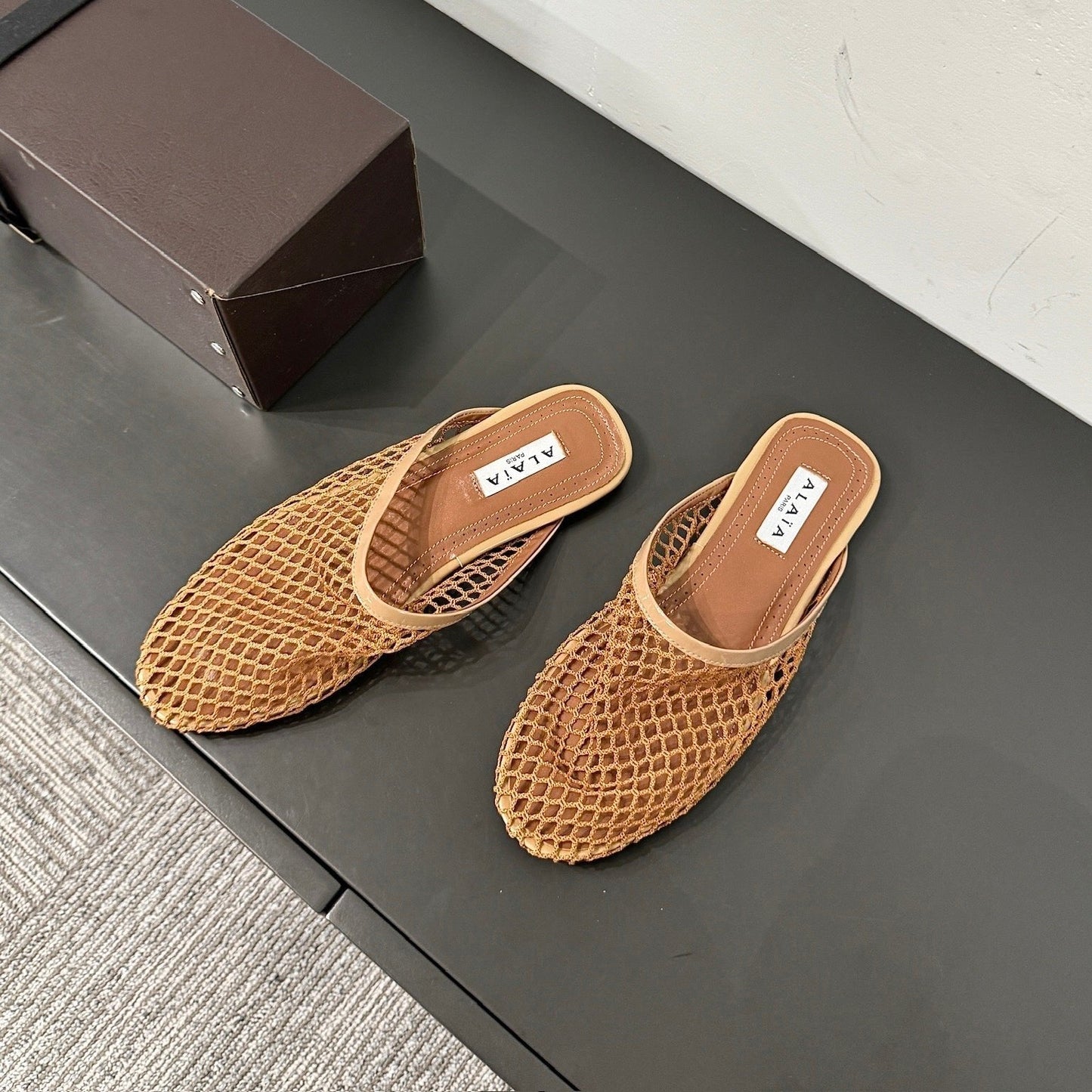 ALAIA FLAT MULES IN COPPER BROWN MESH FISHNET - 34