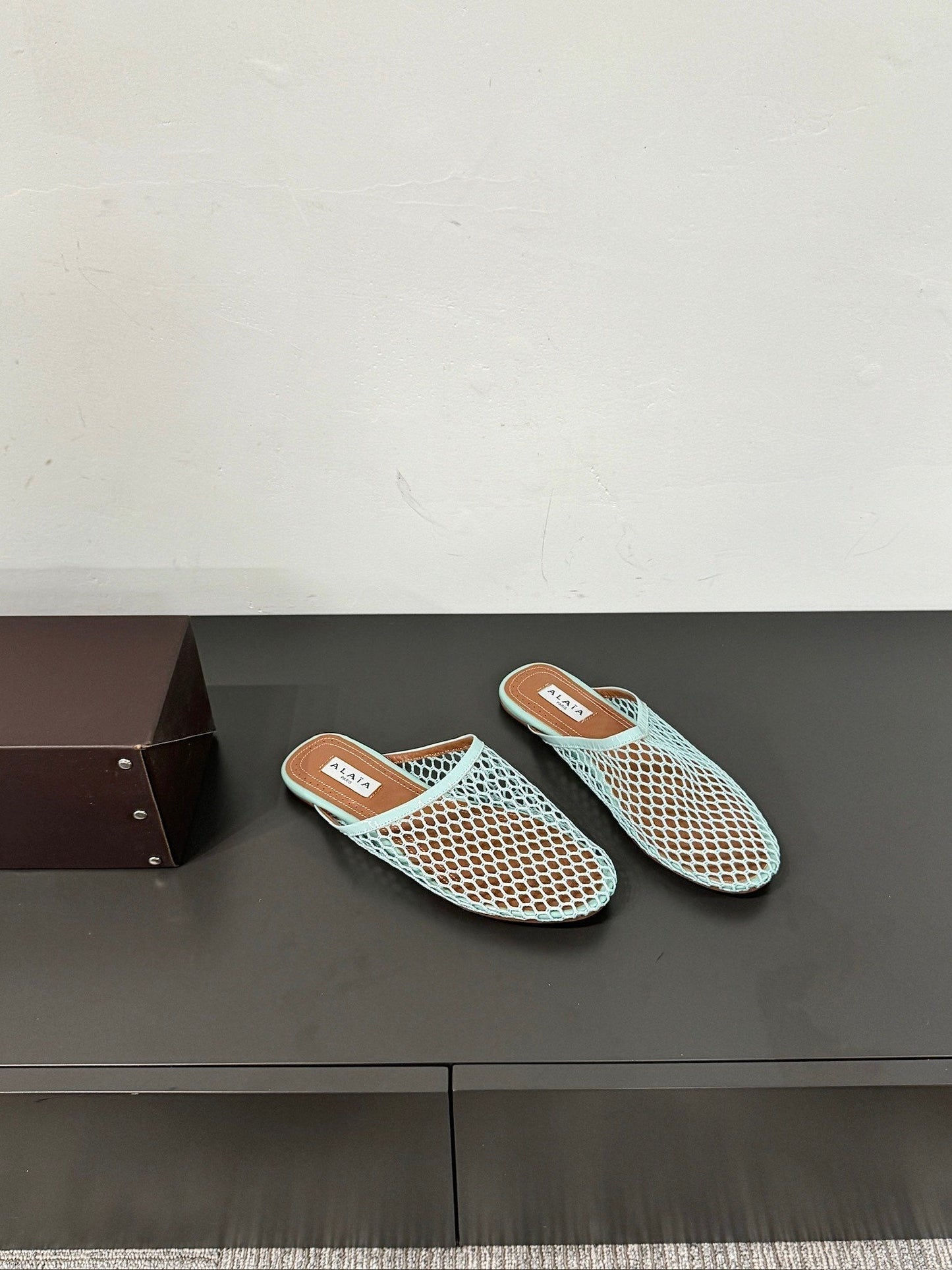 ALAIA FLAT MULES IN LIGHT BLUE MESH FISHNET - 34