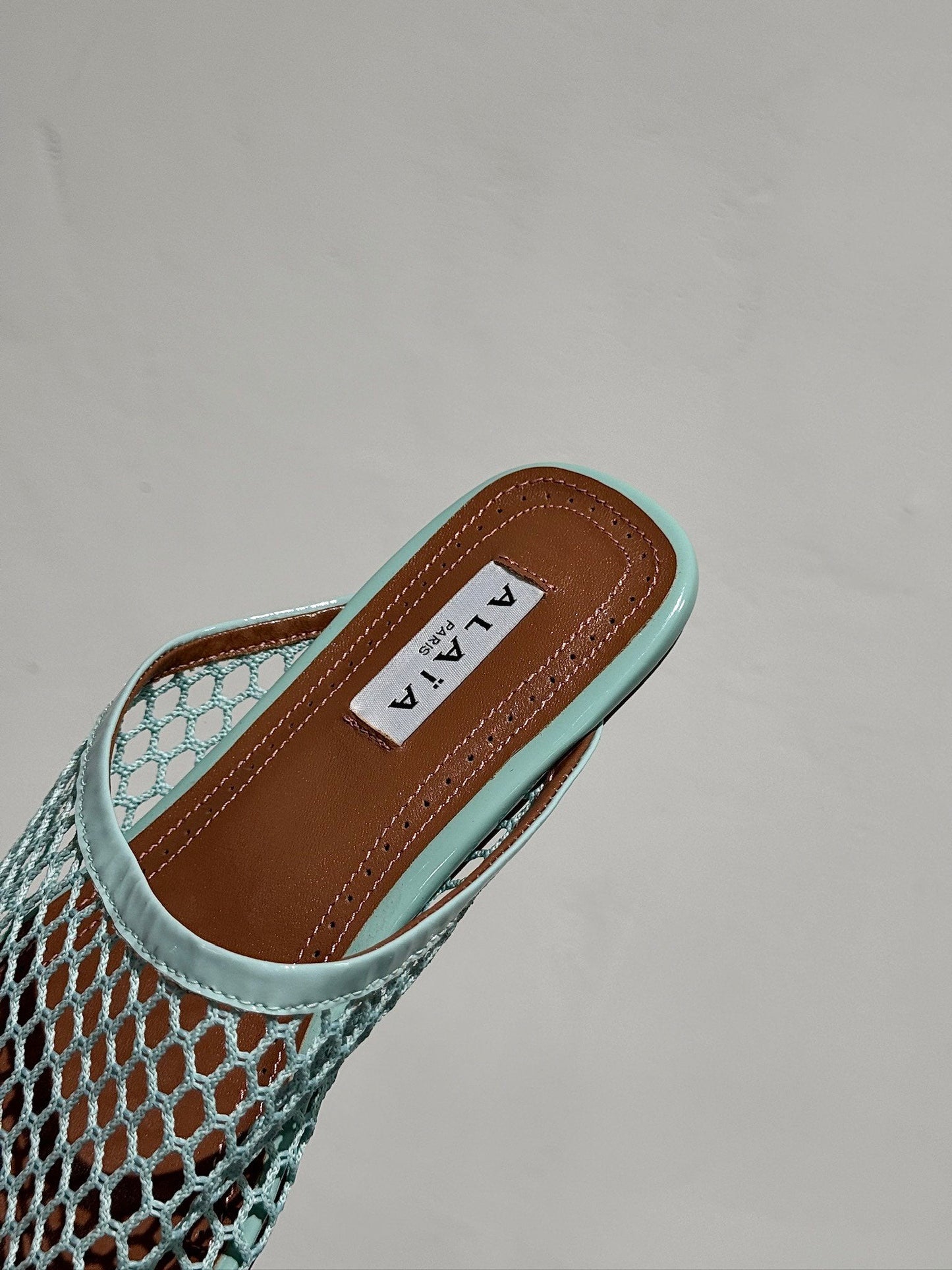 ALAIA FLAT MULES IN LIGHT BLUE MESH FISHNET - 34