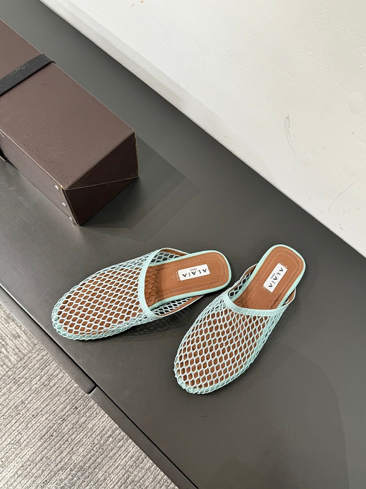 ALAIA FLAT MULES IN LIGHT BLUE MESH FISHNET - 34