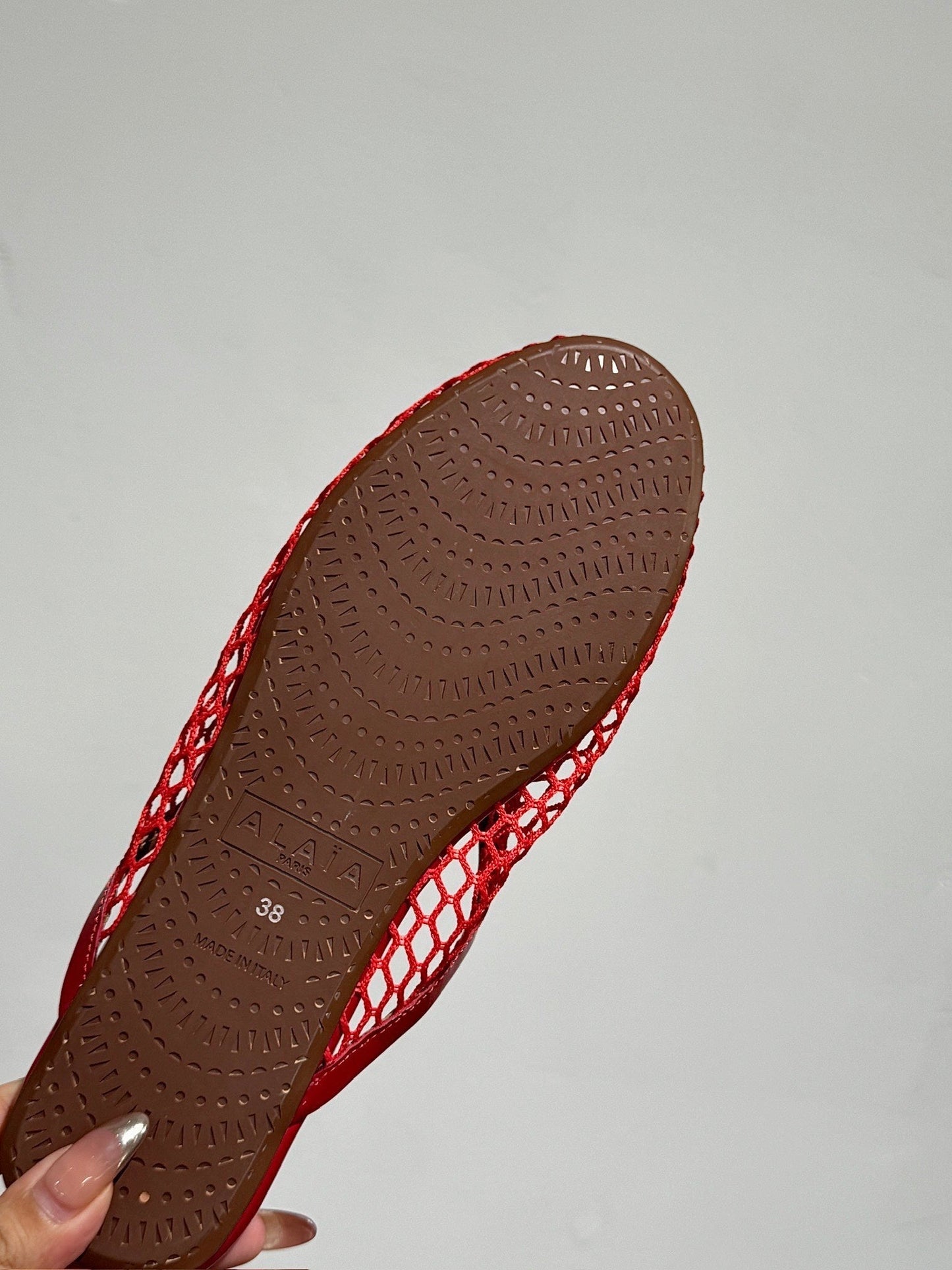 ALAIA FLAT MULES IN CHERRY RED MESH FISHNET - 34