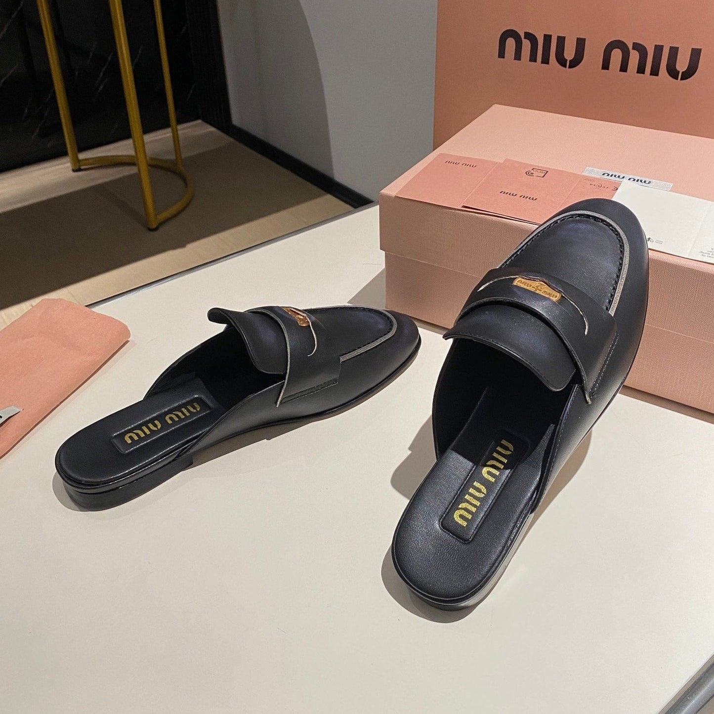 MULES SLIPPERS BLACK COWHIDE WITH GOLD COIN - 34