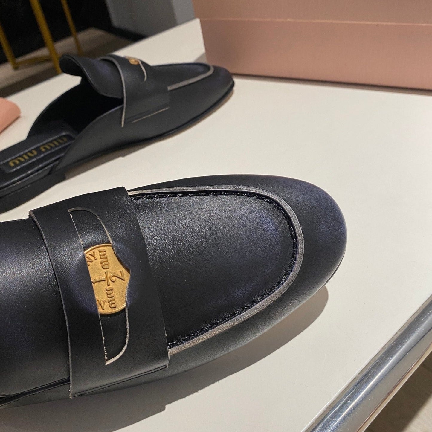MULES SLIPPERS BLACK COWHIDE WITH GOLD COIN - 34