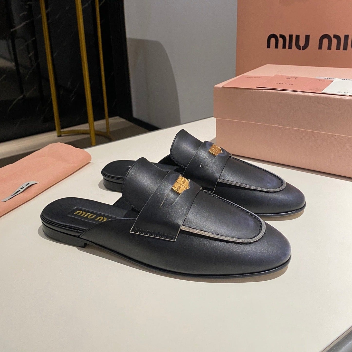 MULES SLIPPERS BLACK COWHIDE WITH GOLD COIN - 34