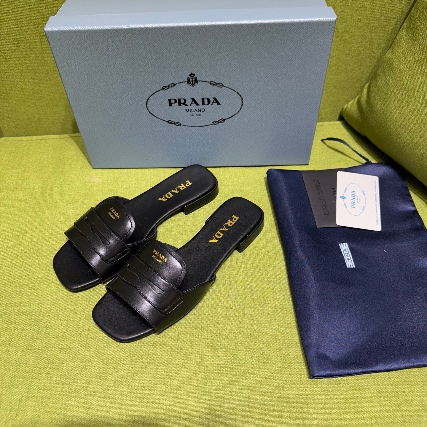 PRADA 25S SLIDES IN BLACK CALFSKIN - 35