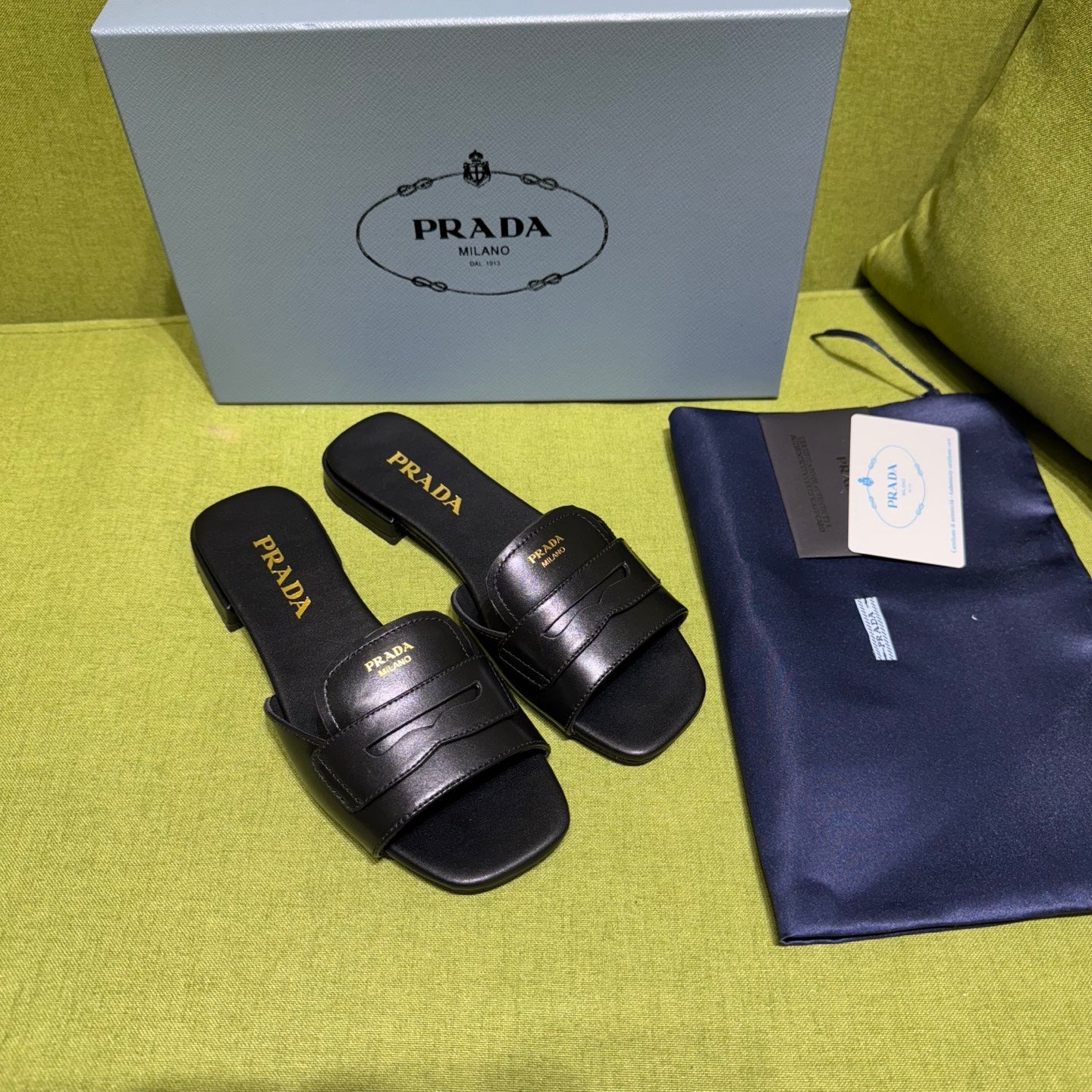 PRADA 25S SLIDES IN BLACK CALFSKIN - 35