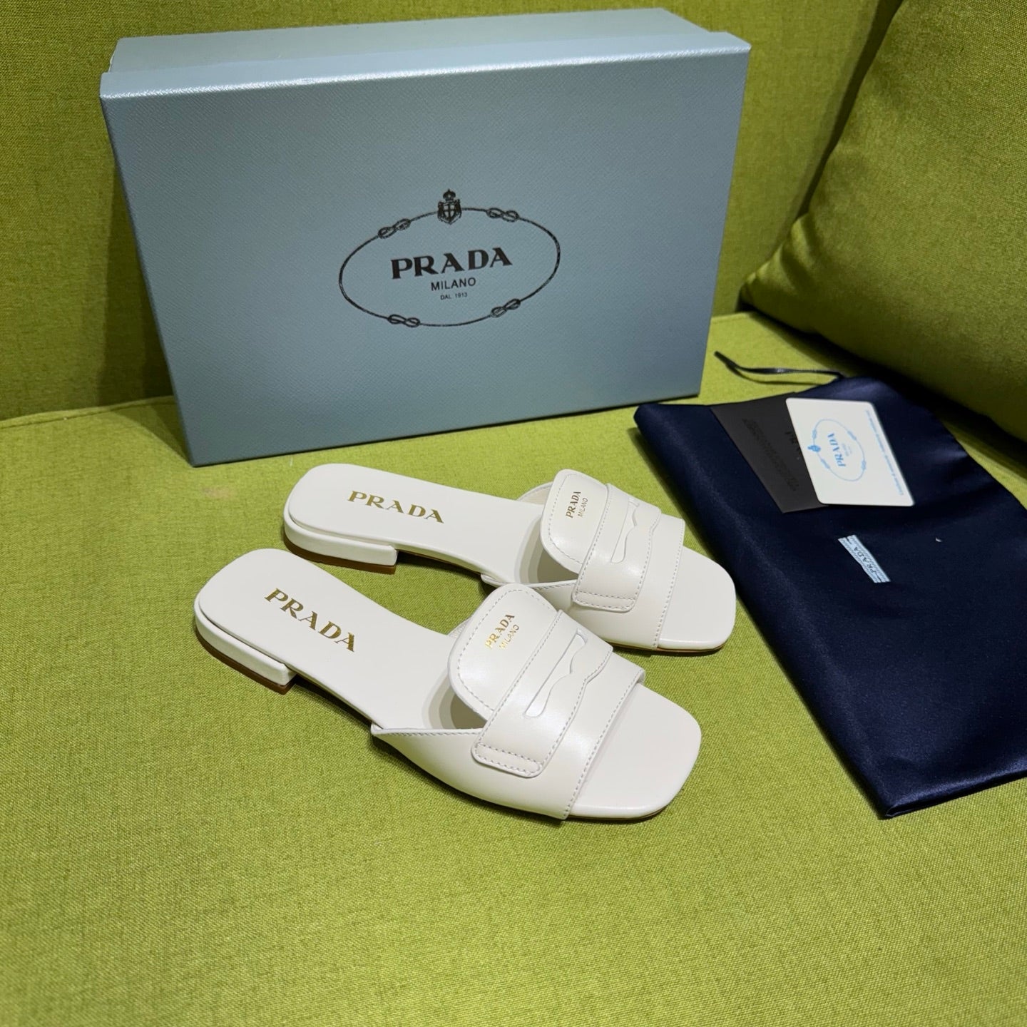 PRADA 25S SLIDES IN WHITE CALFSKIN - 35