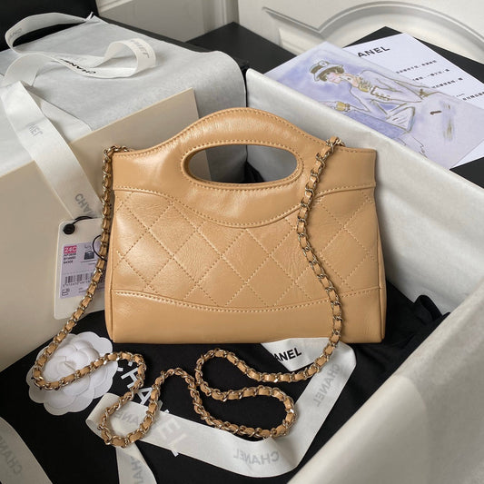 CHANEL 25S СУМКА З ВЕРХНЬОЮ РУЧКОЮ 20 СМ З ТЕМНО-БЕЖЕВОЇ ШКІРИ ЯГНЯТИ