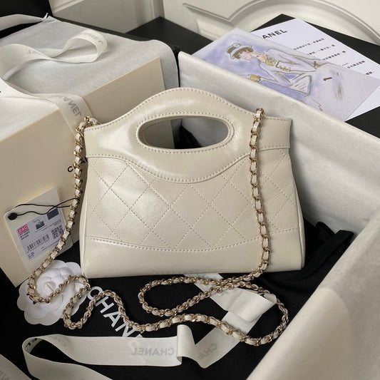 CHANEL 25S СУМКА З ВЕРХНЬОЮ РУЧКОЮ 20 СМ З КРЕМОВО-БІЛОЇ ОВЕЧОЇ ШКІРИ