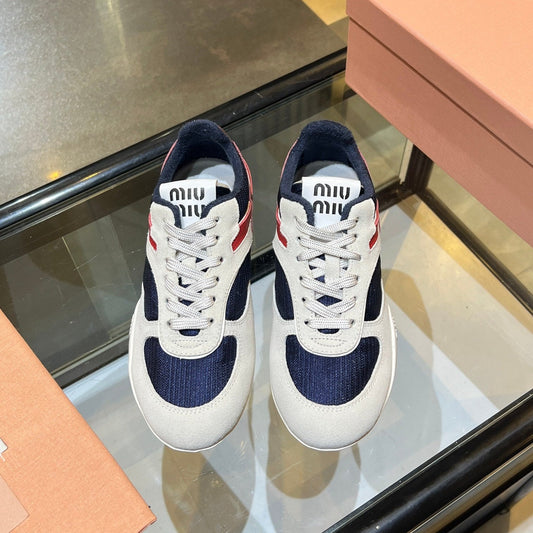 Кросівки MIUMIU 26S з тканини та замші темно-синього та білого кольорів