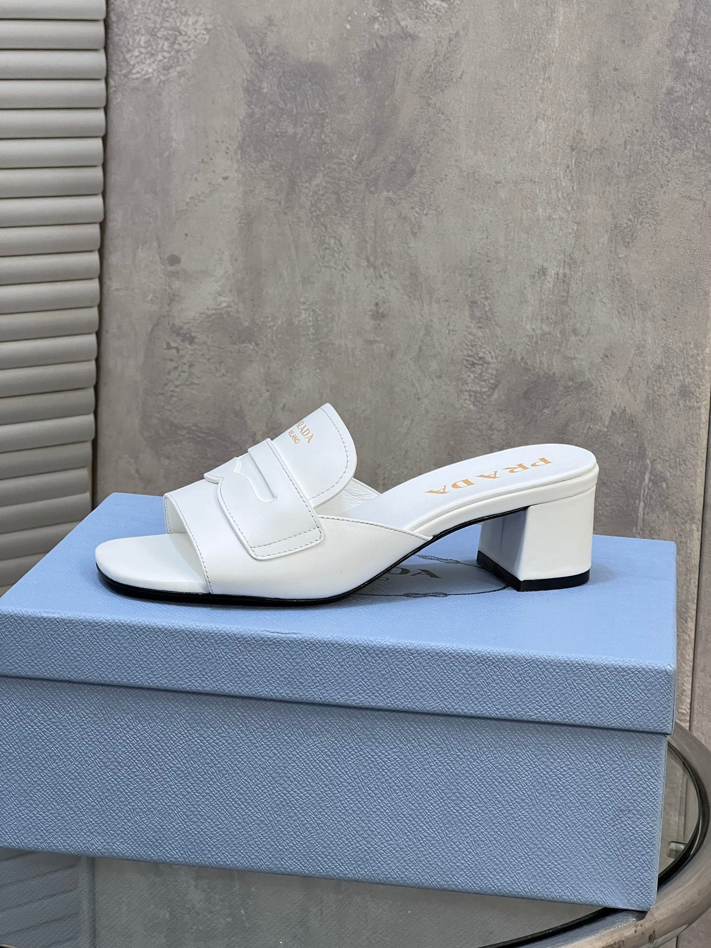 PRADA 26S BLOCK HEEL SLIDE SANDALS 60MM IN WHITE CALFSKIN WITH LOGO
