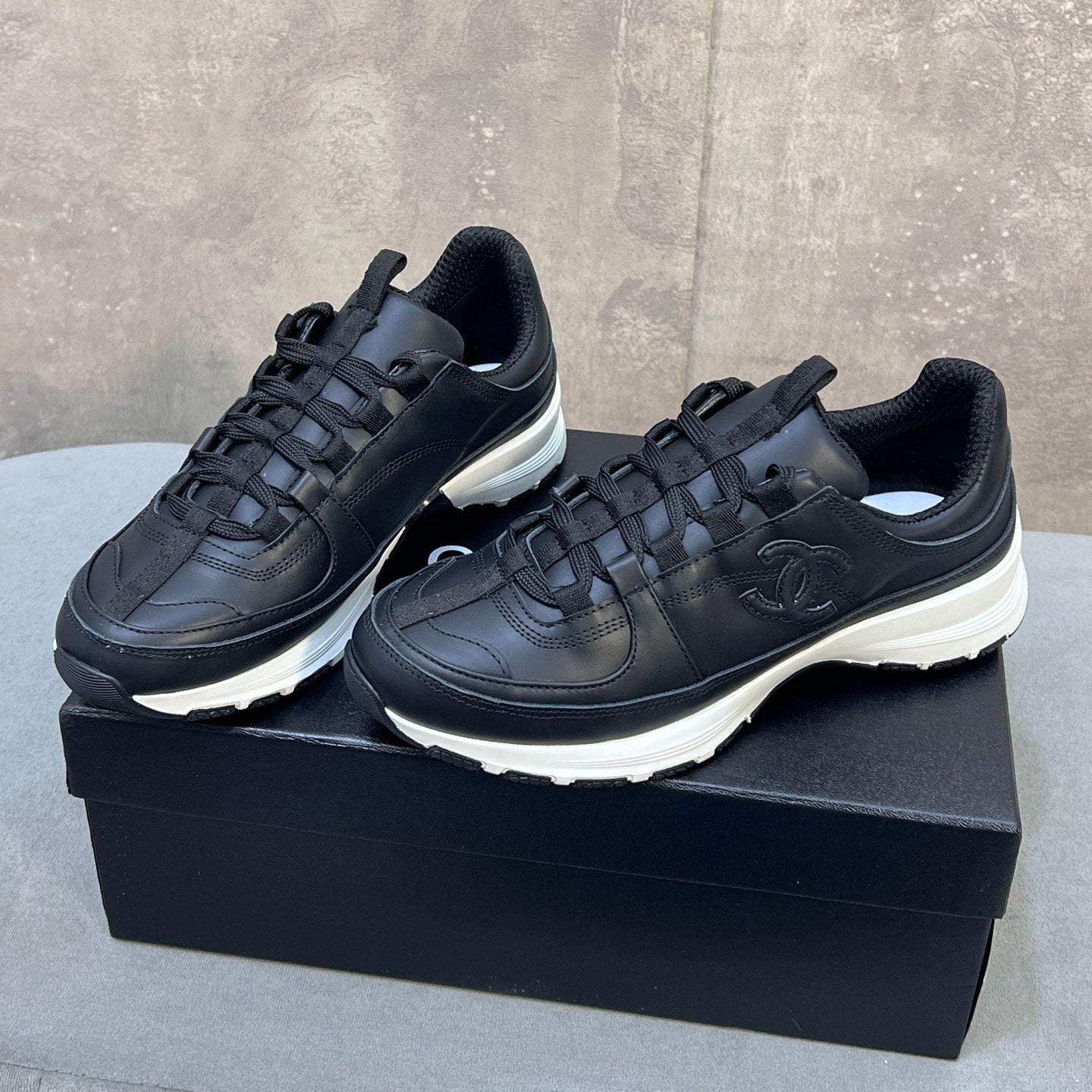CHANEL 26S RUNNER CC LOGO SNEAKERS IN BLACK CALFSKIN