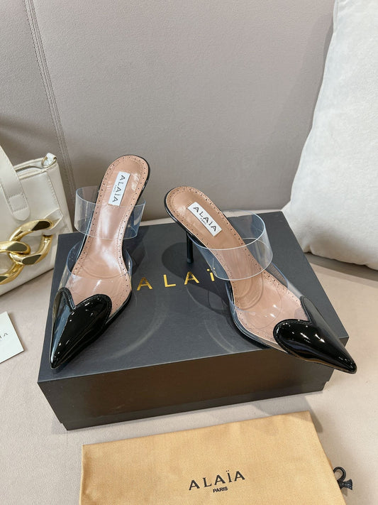ALAIA HIGH MULES IN BLACK PATENT CALFSKIN AND FILM - 35