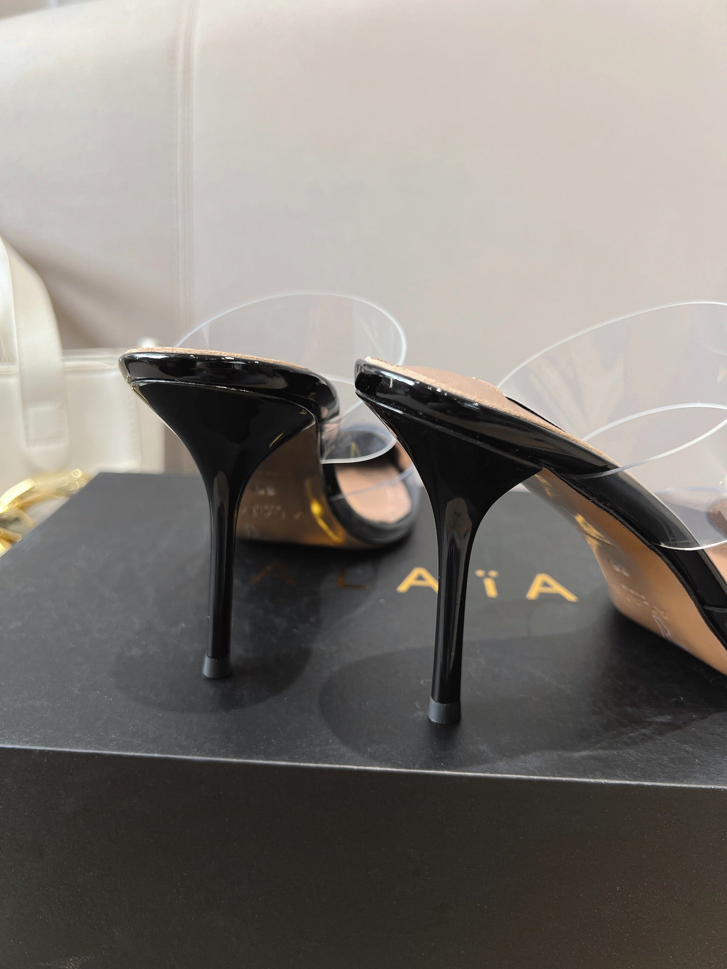 ALAIA HIGH MULES IN BLACK PATENT CALFSKIN AND FILM - 35