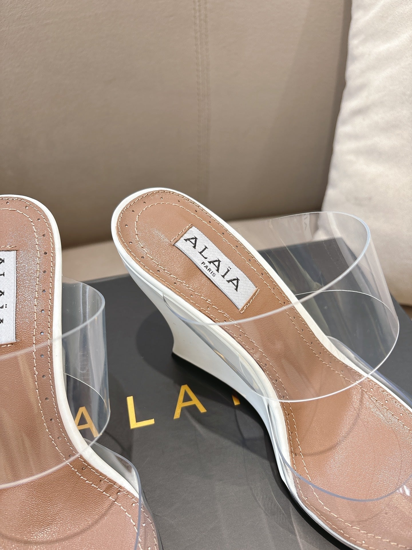 ALAIA 26S HIGH-HEEL WEDGE MULES 95 MM IN WHITE GLOSSY CALFSKIN