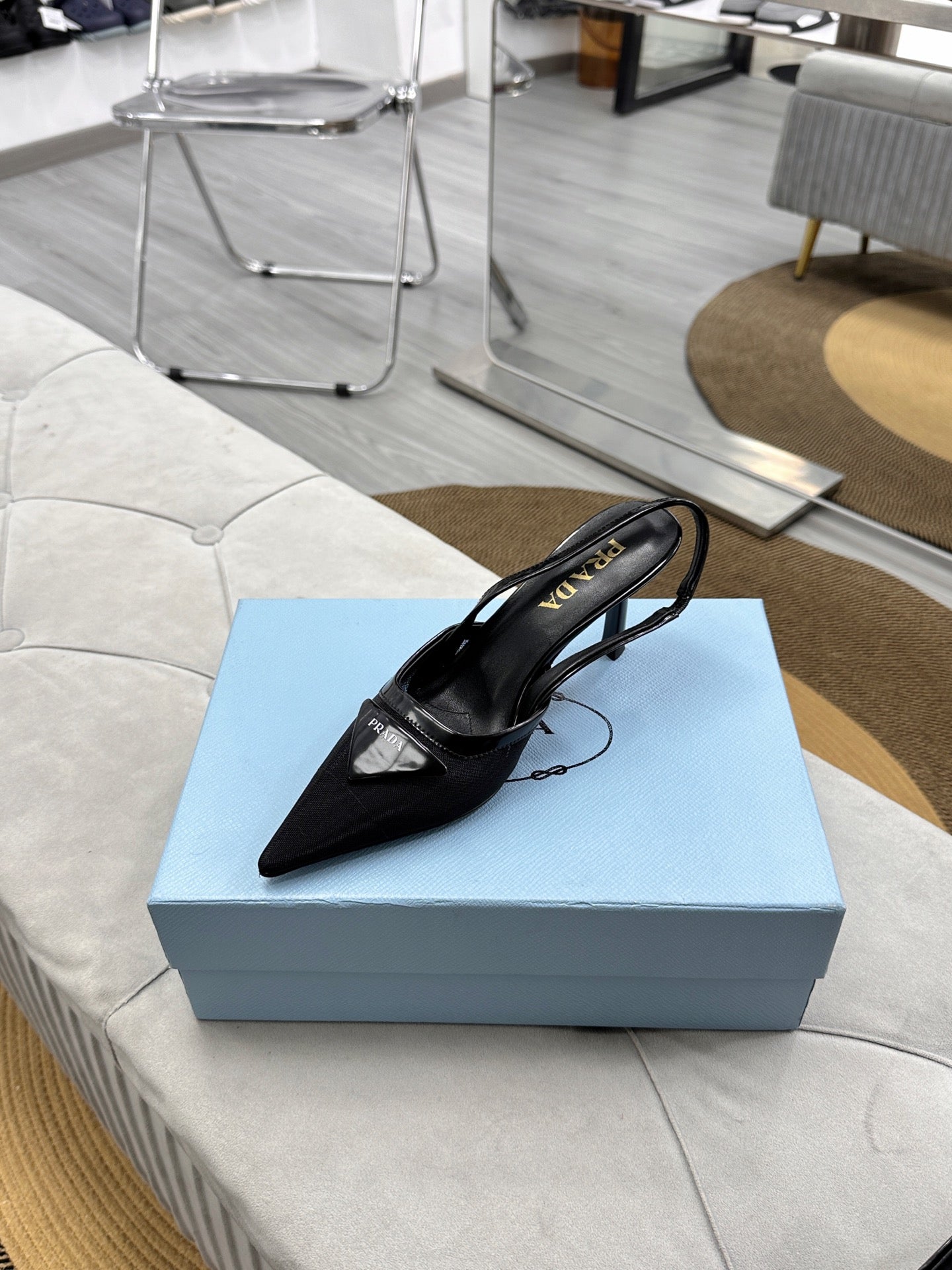 PRADA 25S TRIANGLE LOGO SLINGBACK PUMPS IN BLACK MESH FABRIC - 35