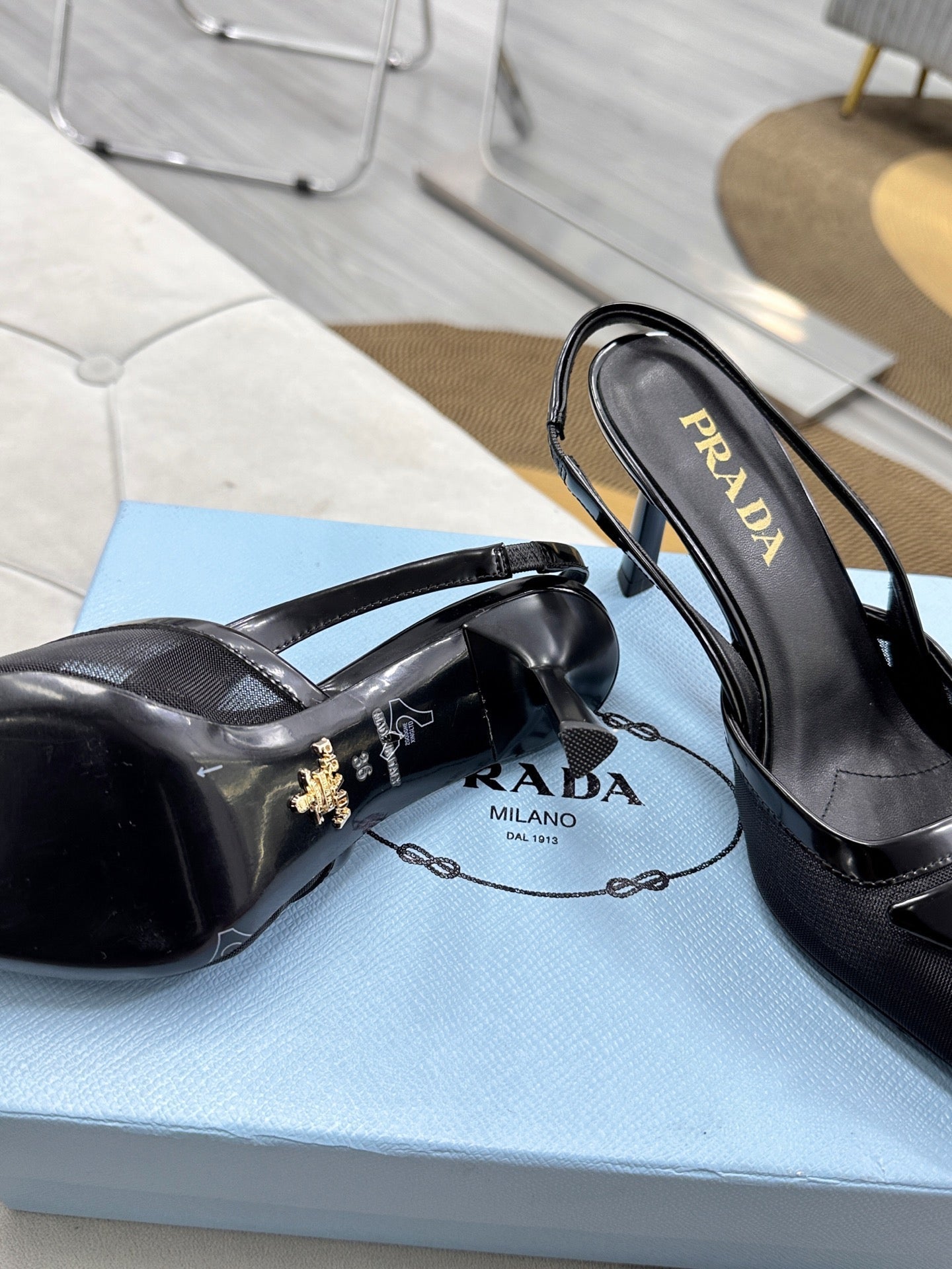 PRADA 25S TRIANGLE LOGO SLINGBACK PUMPS IN BLACK MESH FABRIC - 35