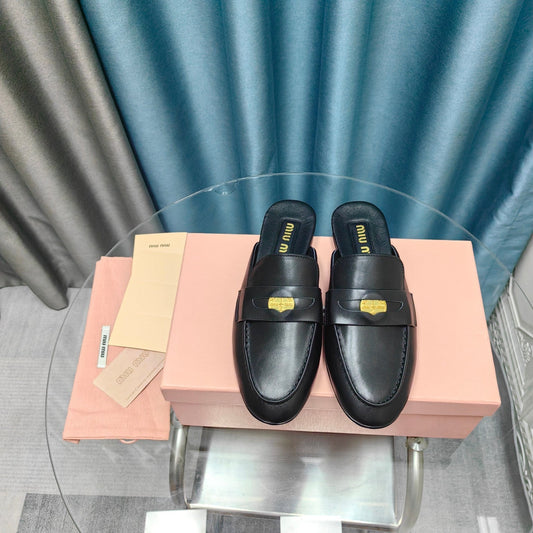 MULES SLIPPERS BLACK COWHIDE WITH GOLD COIN - 35