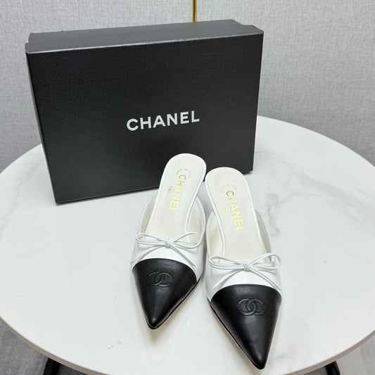 CC HEEL MULES 25S IN BLACK AND WHITE LAMBSKIN WITH BOW - 35