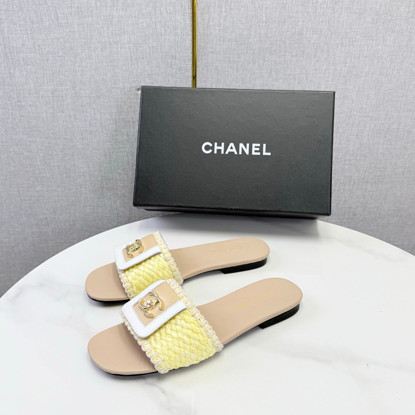 CHANEL 26S WOVEN STRAP SLIDES IN YELLOW AND BEIGE LAMBSKIN