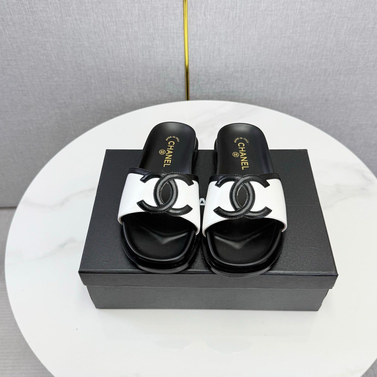 CHANEL 26S ICONIC CC SLIDES IN WHITE LAMBSKIN