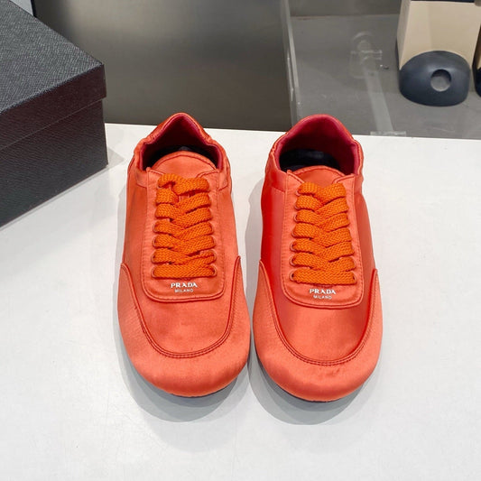 КРОСІВКИ PRADA 26S З АТЛАСУ КОЛЬОРУ "СПАЛЕНИЙ ПОМАРАНЧ"