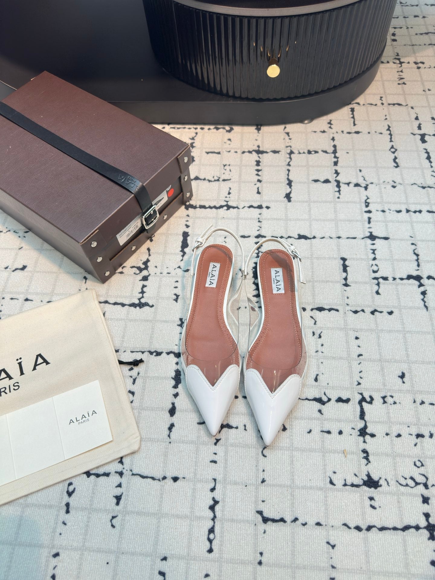 ALAIA FLAT SLINGBACK IN WHITE PATENT CALFSKIN AND FILM - 34