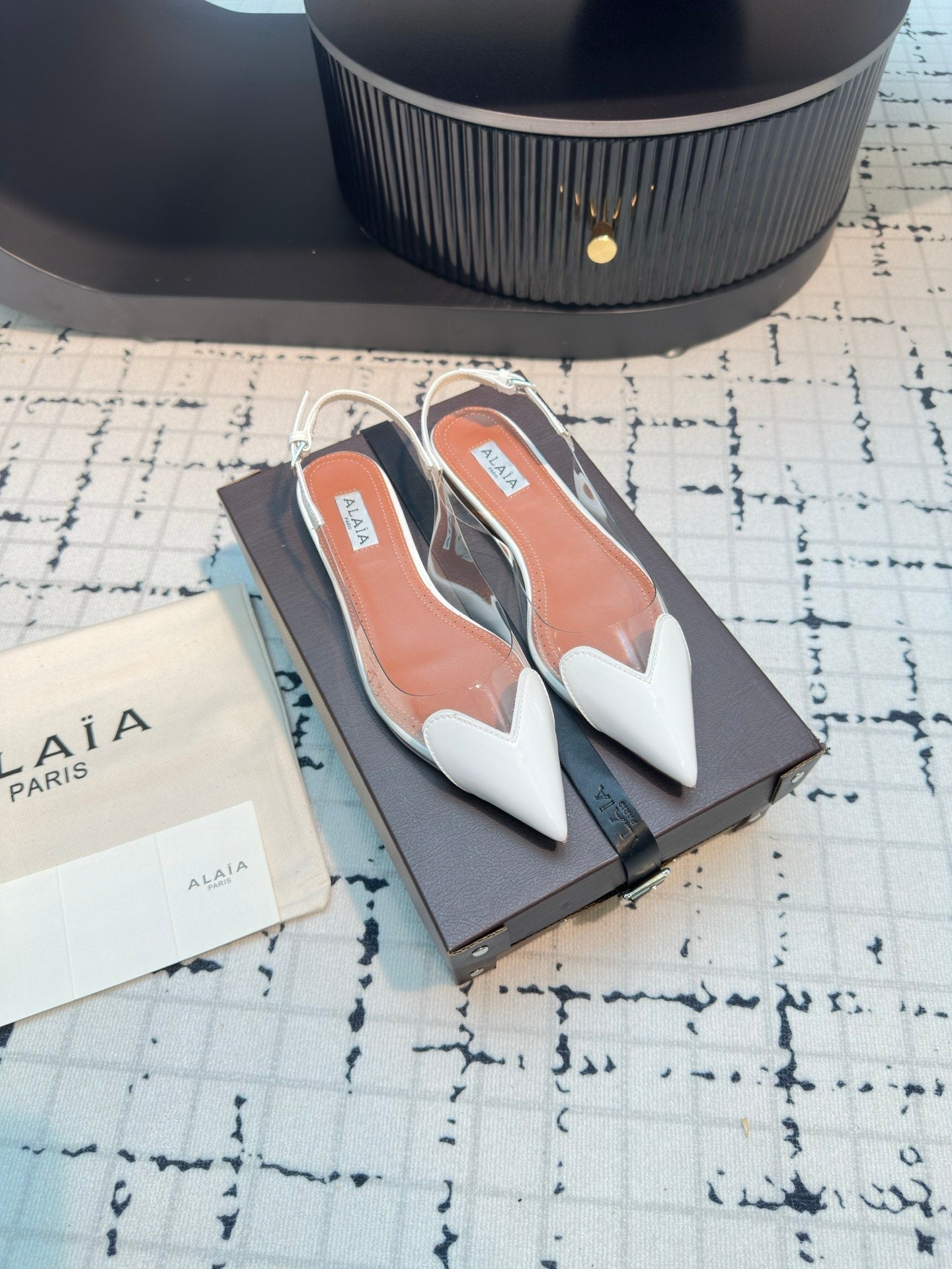 ALAIA FLAT SLINGBACK IN WHITE PATENT CALFSKIN AND FILM - 34