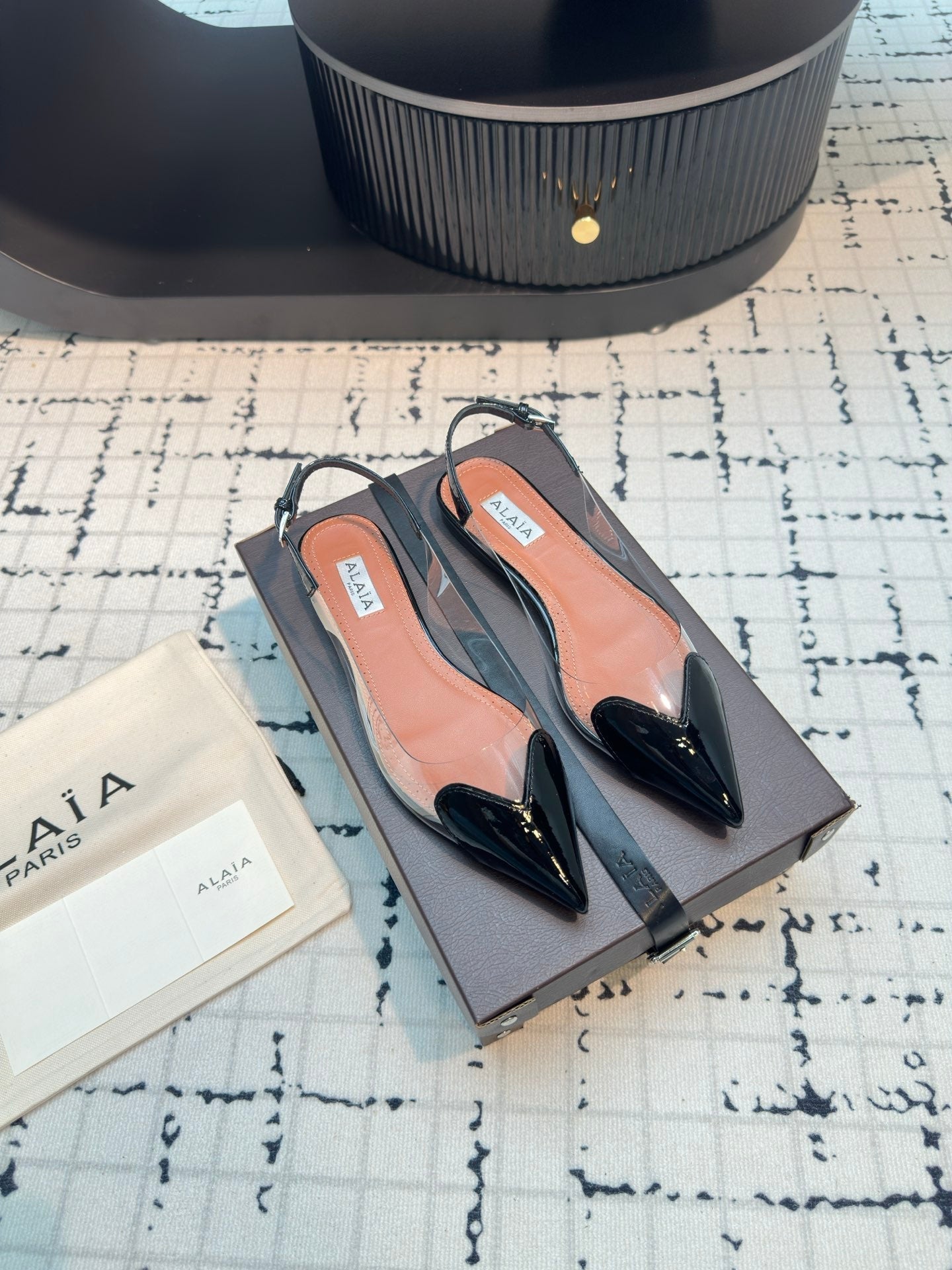 ALAIA FLAT SLINGBACK IN BLACK PATENT CALFSKIN AND FILM - 34