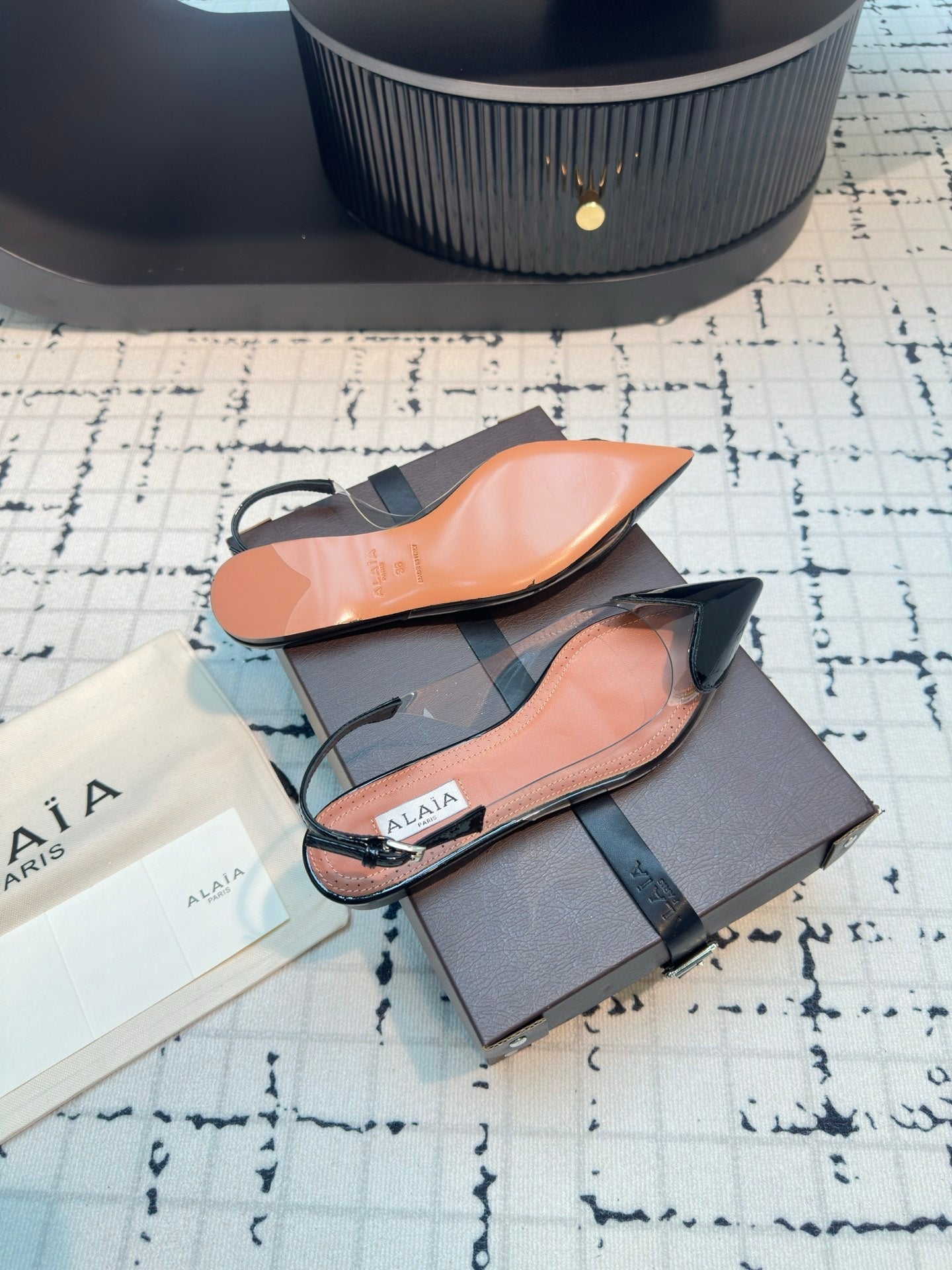 ALAIA FLAT SLINGBACK IN BLACK PATENT CALFSKIN AND FILM - 34
