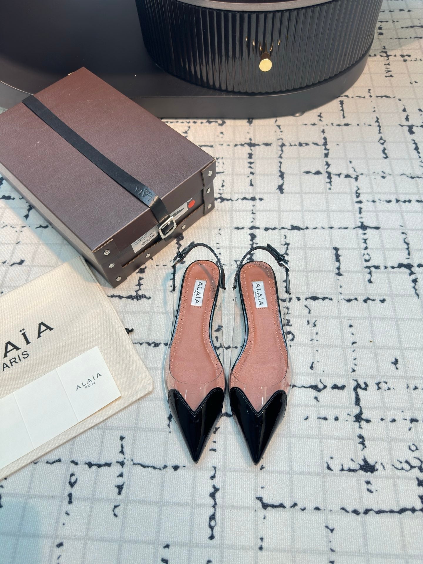 ALAIA FLAT SLINGBACK IN BLACK PATENT CALFSKIN AND FILM - 34