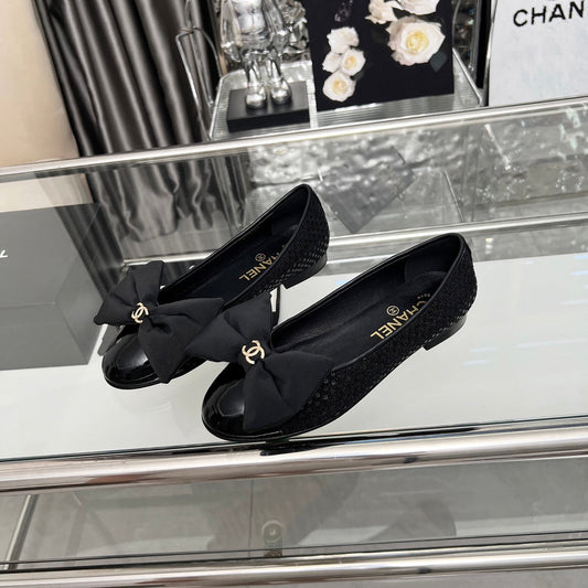 CHANEL 25S ROUND TOE BALLET FLATS WITH A BOW IN SPARKLING BLACK CANVAS - 35