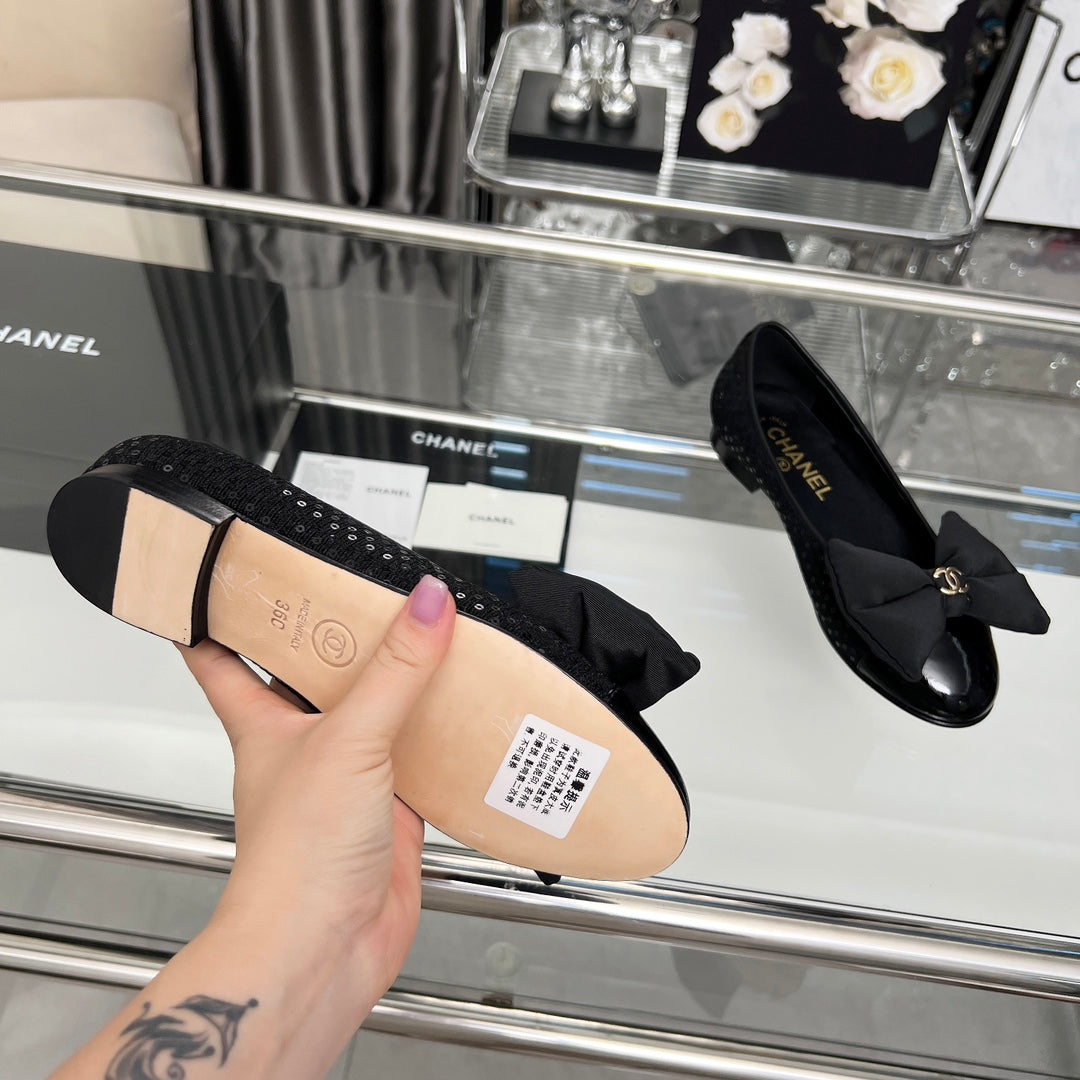 CHANEL 25S ROUND TOE BALLET FLATS WITH A BOW IN SPARKLING BLACK CANVAS - 35