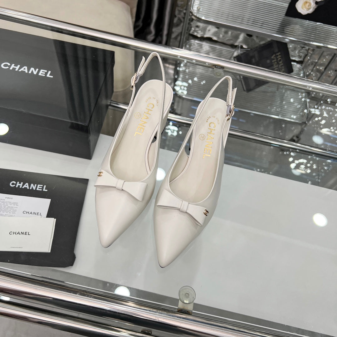 CHANEL 25S SANDALS WITH A BOW 60MM IN WHITE CALFSKIN - 35