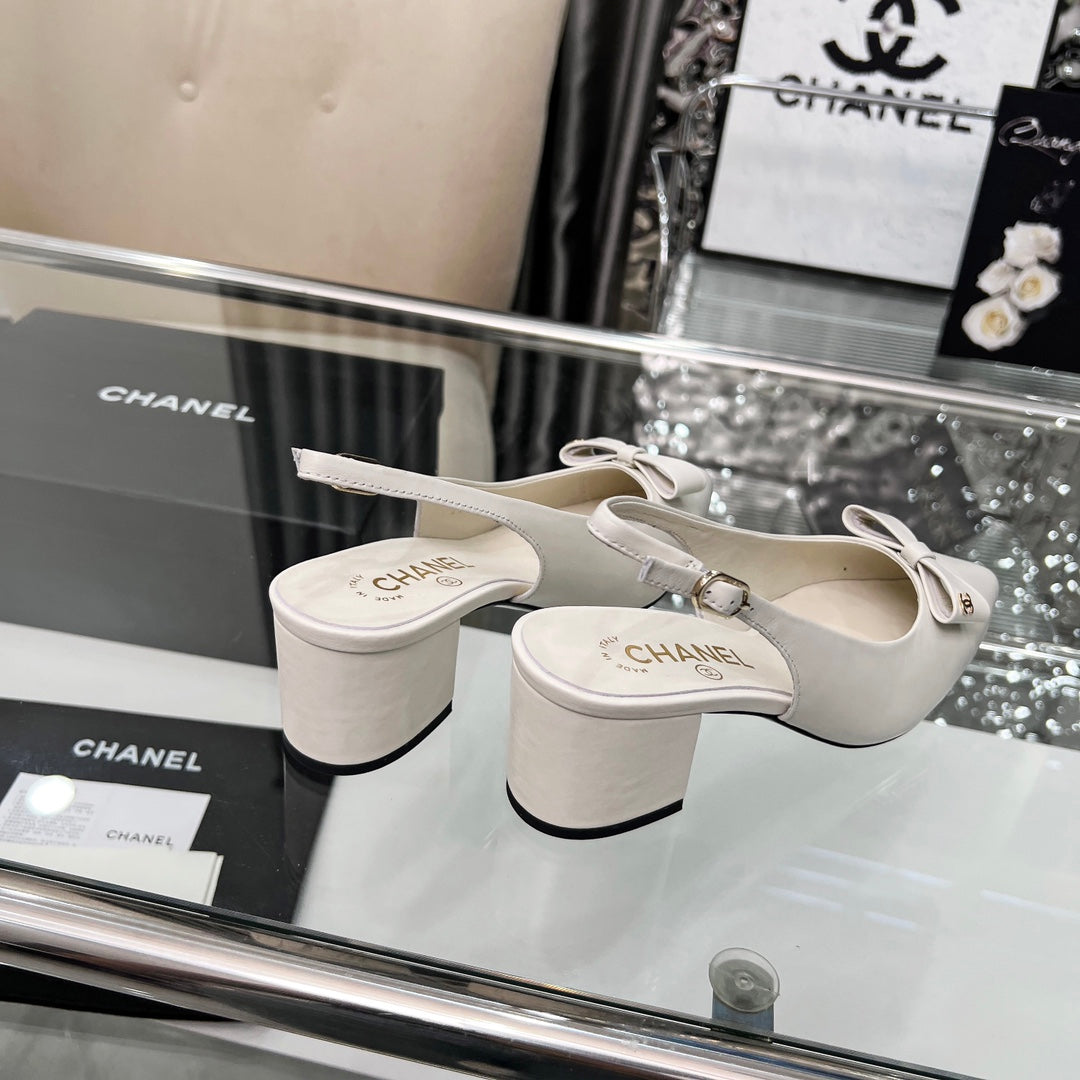 CHANEL 25S SANDALS WITH A BOW 60MM IN WHITE CALFSKIN - 35