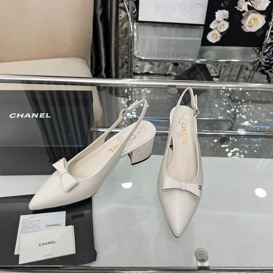 CHANEL 25S SANDALS WITH A BOW 60MM IN WHITE CALFSKIN - 35