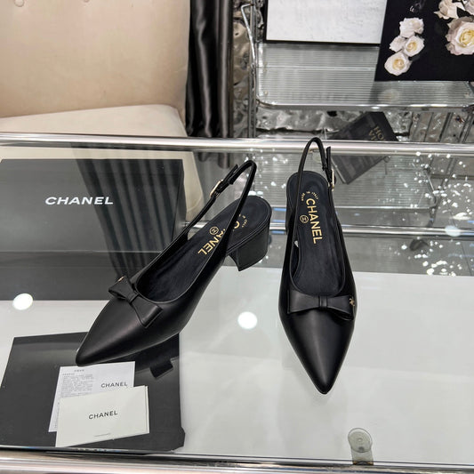 CHANEL 25S SANDALS WITH A BOW 60MM IN BLACK CALFSKIN - 35
