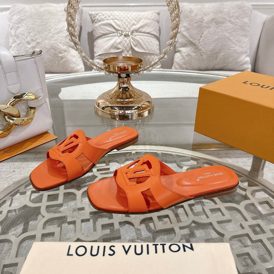 ISOLA FLAT SLIDE IN VIVID ORANGE CALFSKIN - 35