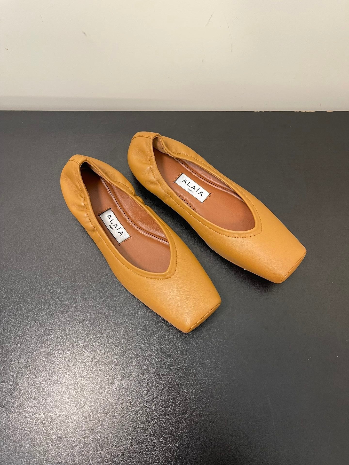 ALAIA BALLET FLATS IN COPPER BROWN SMOOTH CALFSKIN - 35