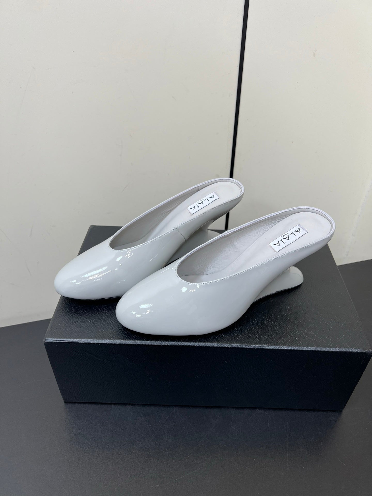 ALAIA WEDGE MULES 25S IN WHITE LAMBSKIN - 35