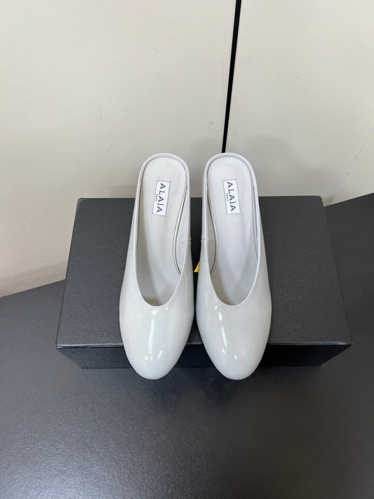 ALAIA WEDGE MULES 25S IN WHITE LAMBSKIN - 35