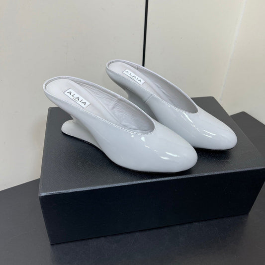 ALAIA WEDGE MULES 25S IN WHITE LAMBSKIN - 35