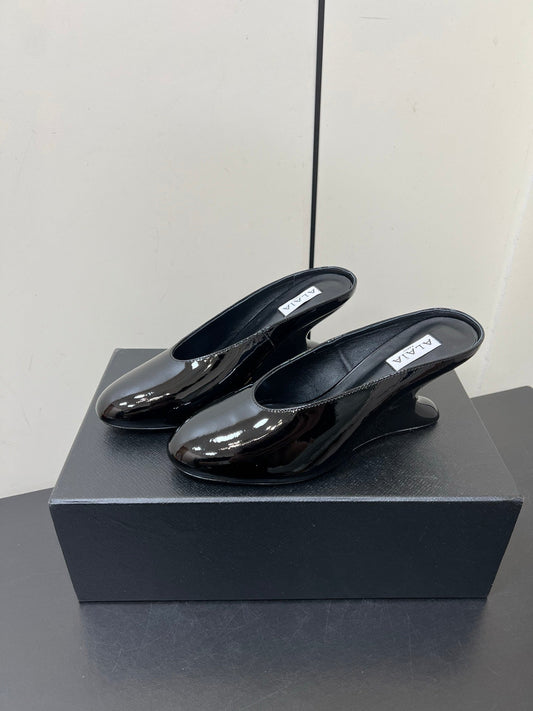 ALAIA WEDGE MULES 25S IN BLACK LAMBSKIN - 35