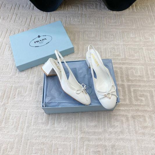 TRIANGLE LOGO SLINGBACK PUMPS WITH BOW IN WHITE CALFSKIN - 35